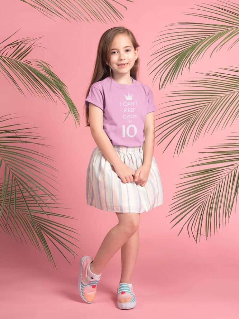 Smiling girl wearing a lavender “I can’t keep calm I’m 10” shirt—perfect 10th birthday gift for girls.