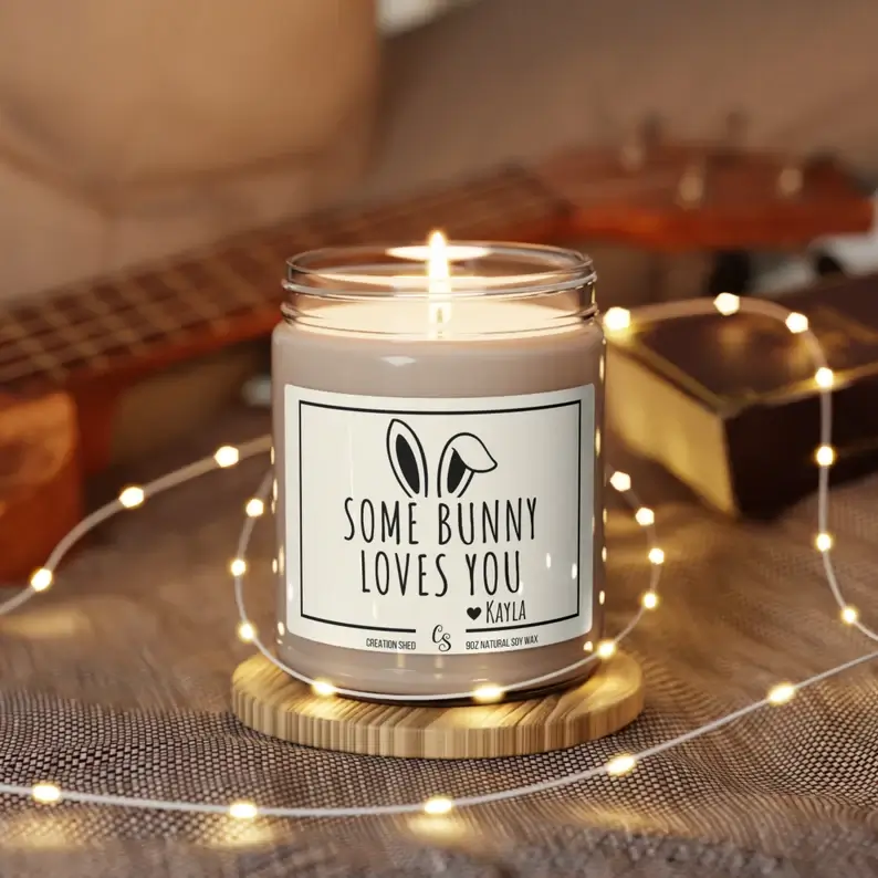 white scented Easter soy candle with 'some bunny loves you' texts perfect for Easter basket for tweens