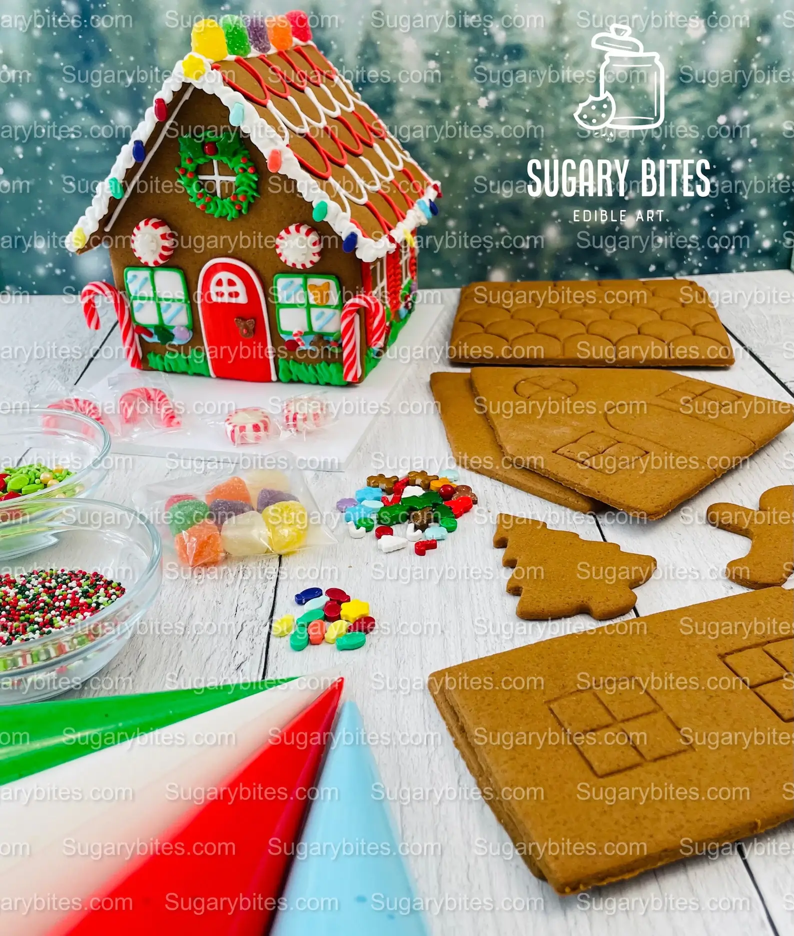 Gingerbread house decorating kit with pre-baked cookie panels, colorful candies, sprinkles, and icing bags beside a fully decorated finished house, a creative Christmas Eve Box idea for tweens.